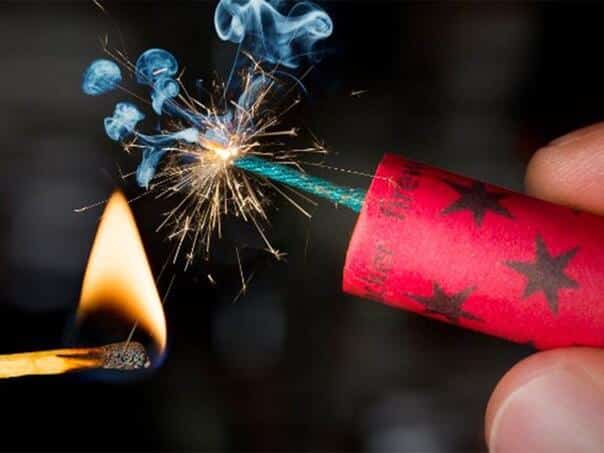 Charges have been filed against a young man who beat two boys over firecrackers
