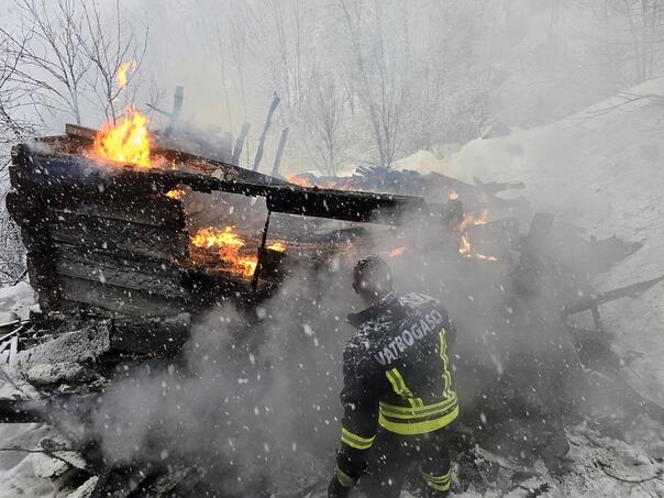 An old woman from Bosnia and Herzegovina. villages were left without a roof over their heads due to the fire
