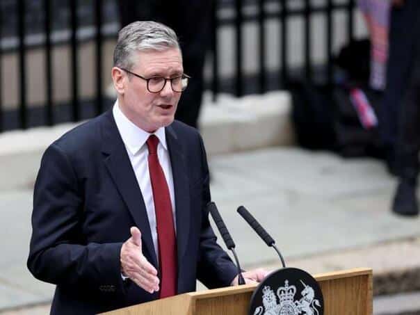 British prime minister announced a reduction in aid to finance the increase in defense costs
