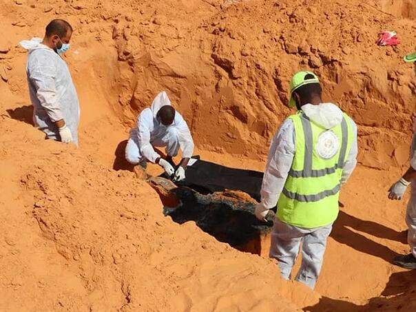 Libya: Almost 50 migrants found in mass graves