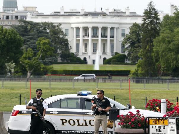 The Secret Service shot an armed man in front of the White House