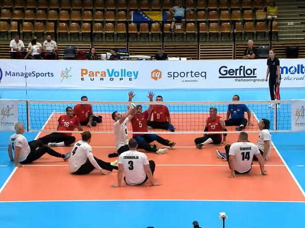 I would break the volleyball players!