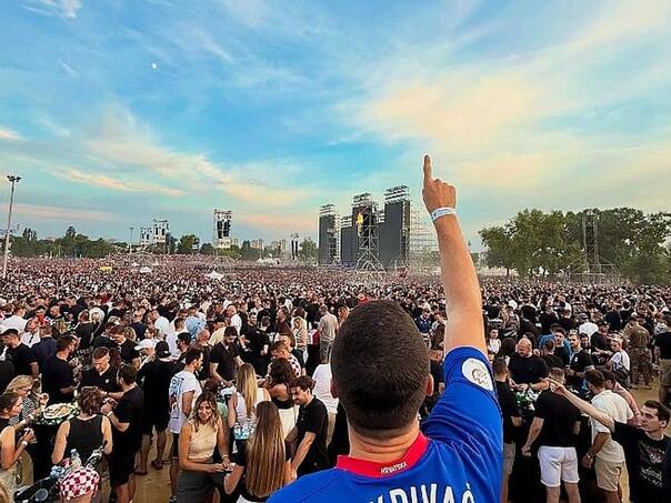 Due to this photograph with Thompson’s concert, the handball player got fired in Serbia