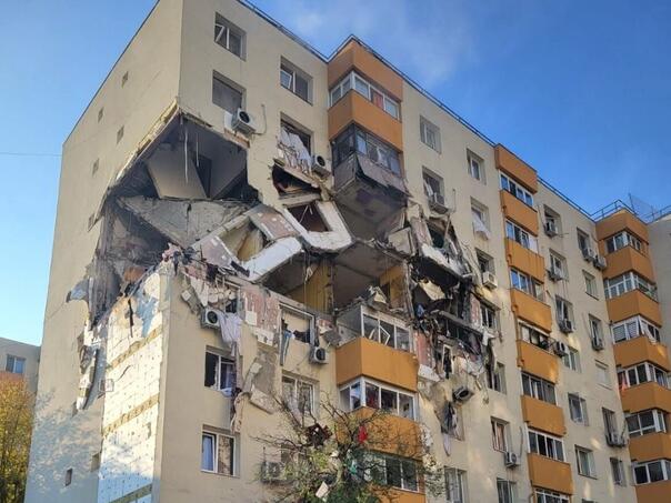 An explosion brought down part of a building in Bucharest, at least three dead