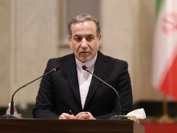 Iran urged the IAEA to refrain from "political actions"