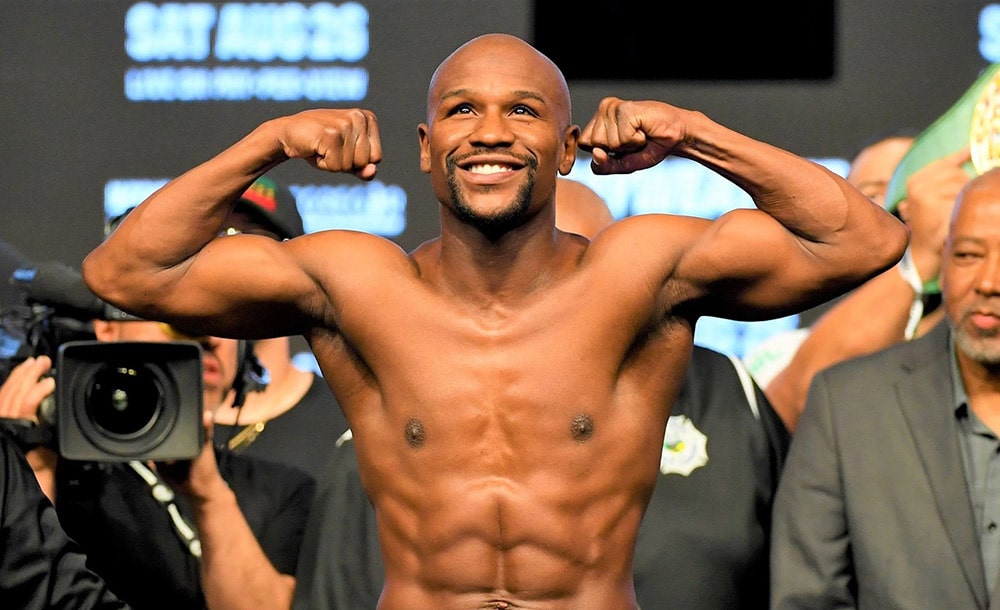 Mayweather enters the ring again, announced a match with Tyson