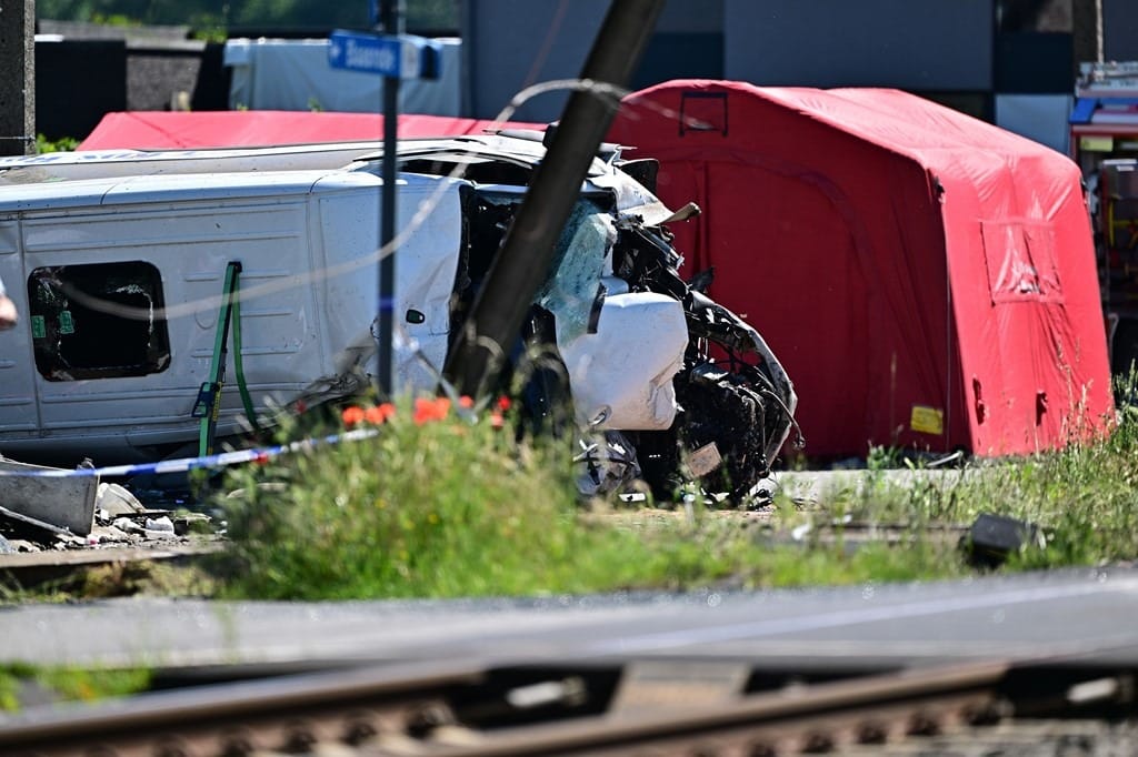 A school bus collided with a train in Belgium, several people were killed