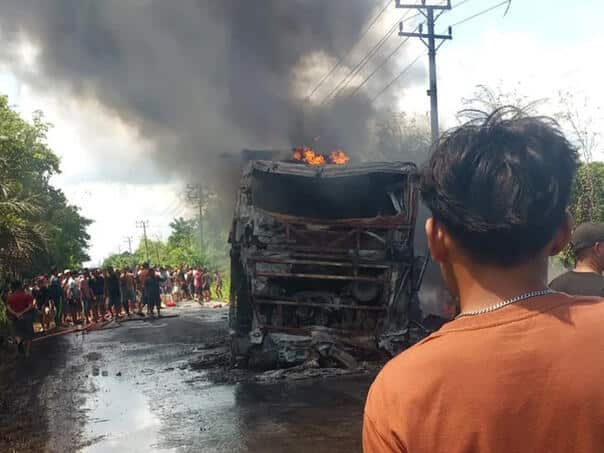 At least 16 people died in a fire after a bus and a tanker collided