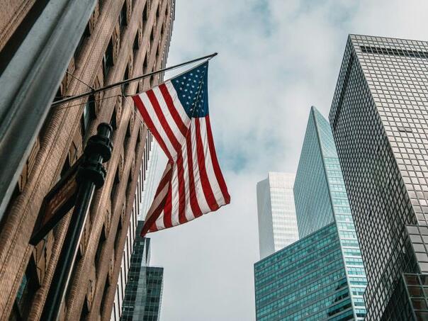 US trade deficit falls below $56 billion